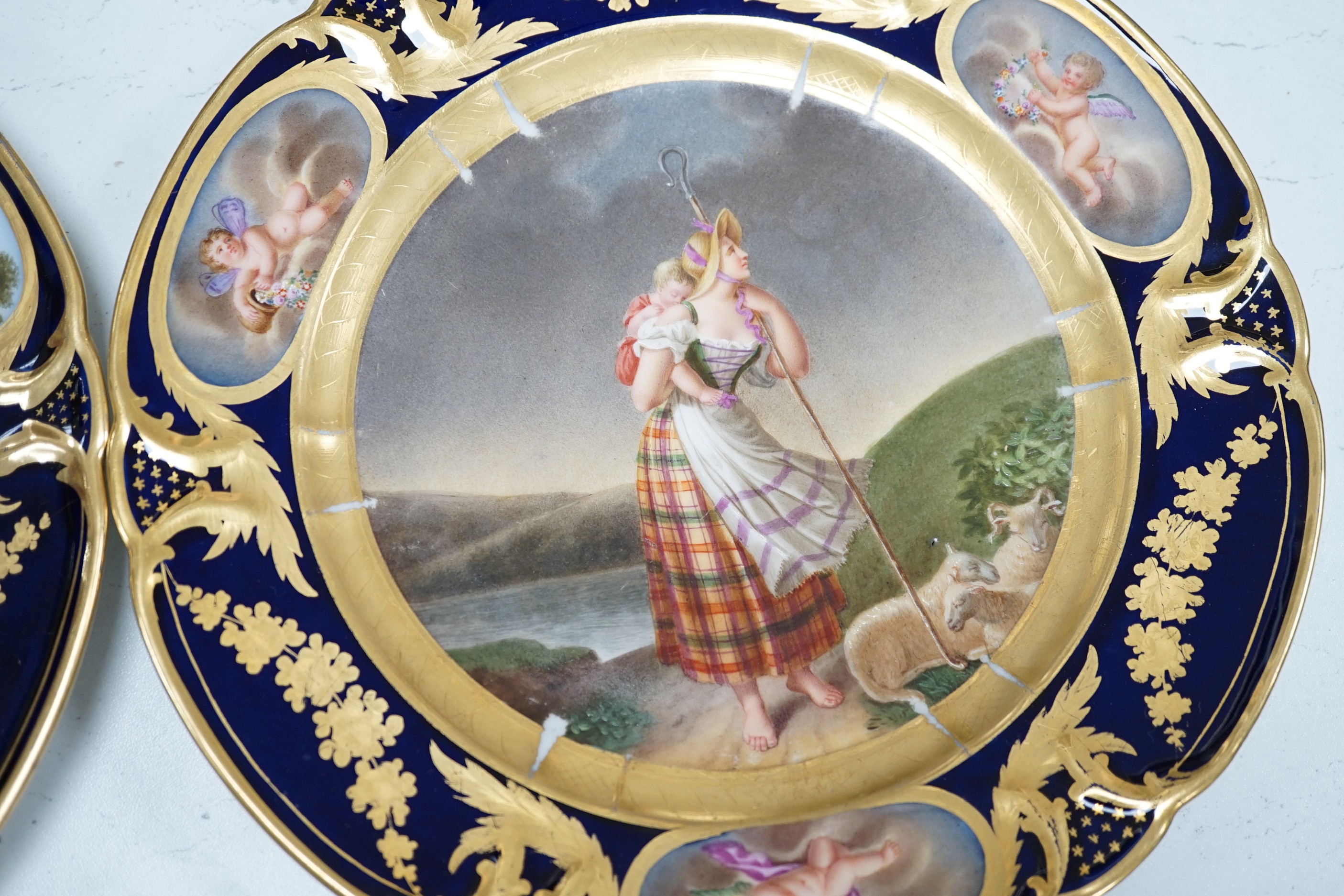 A group of 19th century Paris porcelain painted cabinet plates together with an associated footed bowl (group), plates 24cms diameter